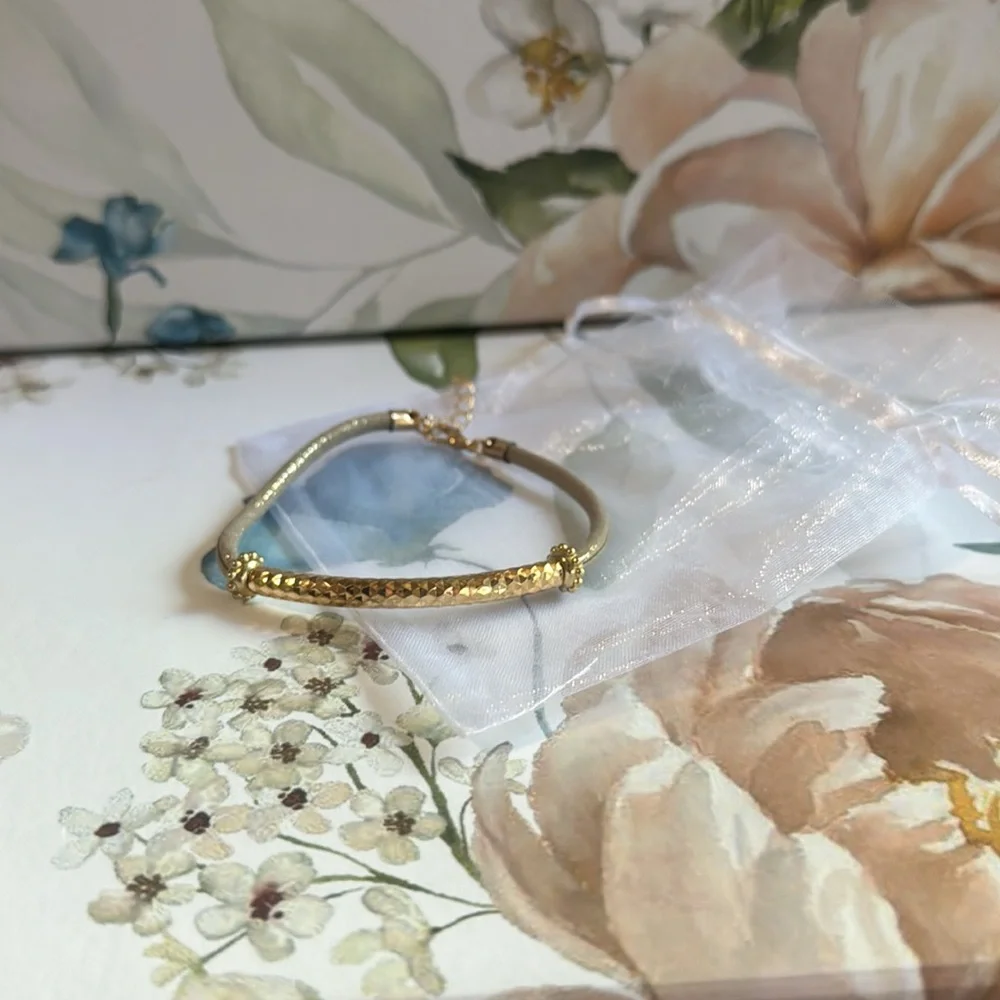Elegant Gold and Tan Bracelet